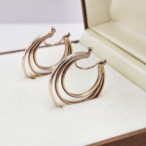 Złote kolczyki potrójne...